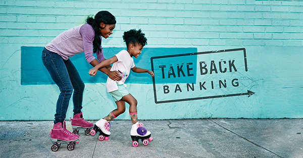 Image of mother with a Kasasa Rewards checking and savings account helping her daughter